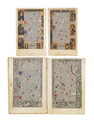 a close up of four pages of an old book