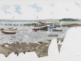 many boats that are sitting on the shore of the water