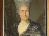 portrait d'une femme portant un chapeau bleu et une robe noire