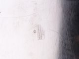 a close up of a person ' s hand holding a cell phone