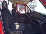 a red truck with black seats in the back of it