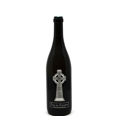 a bottle of wine with a celtic design on it
