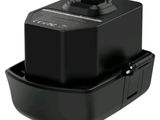 a black and white photo of a battery charger on a white background