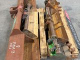 two pieces of machinery that are sitting on a pallet