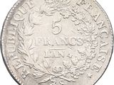 a close up of a coin on a white background