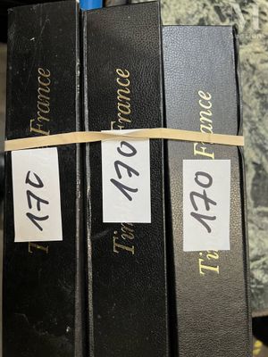 three books that are stacked on top of each other
