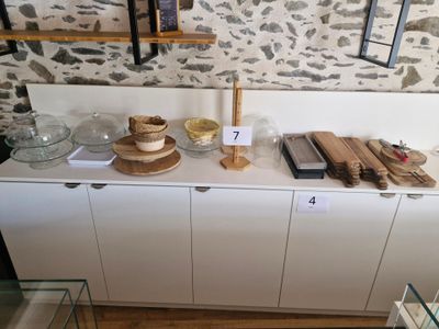 a display of various items on a table in a room