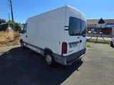 a white van that is parked in the parking lot