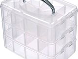 une image représentant une boîte en plastique transparent munie d'une poignée