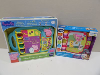 two children ' s toys in the box on the table