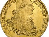 une pièce d'or sur laquelle figure le portrait d'un homme de profil