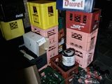 a pile of boxes and crates sitting on the floor