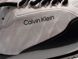 a close up view of a pair of shoes with black and white laces
