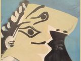 une image représentant une affiche sur laquelle figure le portrait d'un homme coiffé d'un chapeau