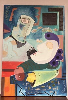 un tableau accroché au mur d'une pièce, représentant un homme et une femme