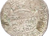 a close up of a coin with a bird on it