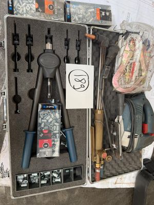 a tool case filled with tools and other items