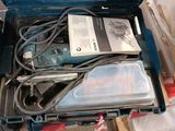 a suitcase with a bunch of electronics inside of it