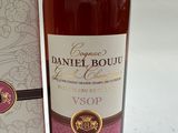a bottle of wine that is next to a box