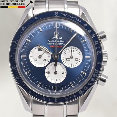 an image of a close up of a wrist watch with a blue dial