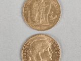 two gold coins with a woman and a man on them