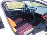 a small car with two seats and a steering wheel