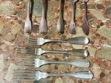 a lot of spoons and spoon spoons on a table