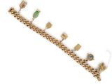 an image of a gold bracelet with various charms on it