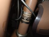 a close up view of a pipe with a sign on it