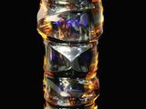 a glass vase that has a lot of different colors in it