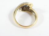 an image of a gold ring with a blue stone and diamonds