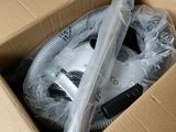 a cardboard box with a helmet inside of it