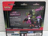 the card is in the packaging for the pokemon toy