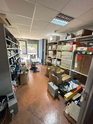 an image of a room with a lot of boxes on the floor