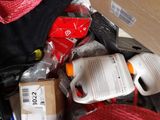 a bag full of items that are sitting on the floor