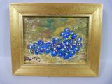 tableau représentant des fleurs bleues dans un cadre doré sur fond blanc