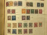 an open book with a lot of stamps on it