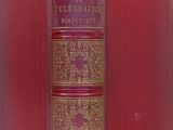 un vieux livre rouge aux bordures dorées et à la couverture rouge