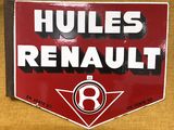 panneau sur la porte d'un immeuble indiquant « Huiles Renault 8 »