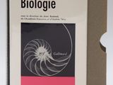 an image of a book in a box on a white surface