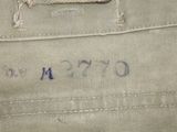 a close up of a piece of clothing with writing on it