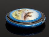 a picture of a blue and white box with a butterfly on it