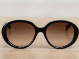 a close up of a pair of sunglasses on a table