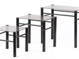 three tables with glass tops and metal legs on a white background