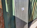 a metal door that has a sticker on the side of it