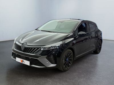 the black car is parked in a white room with a black floor