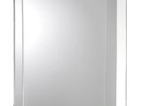 a close up of a mirror on a wall with a white background
