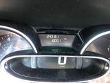 a close up of a car dashboard with a speedometer