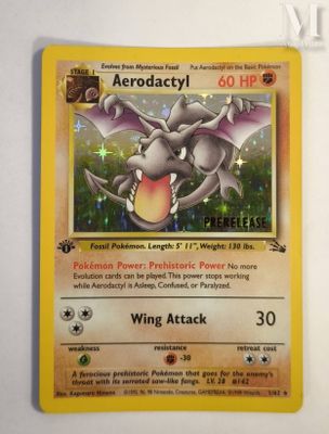 a close up of a pokemon card on a white surface