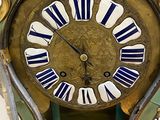 a clock that is sitting on top of a table